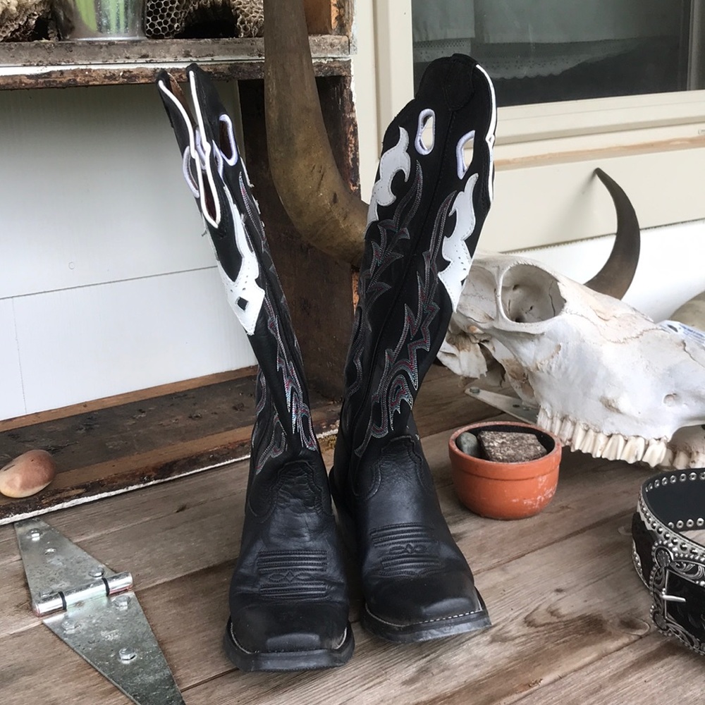 Matching pair Tony Lama boots and Nocona belt.